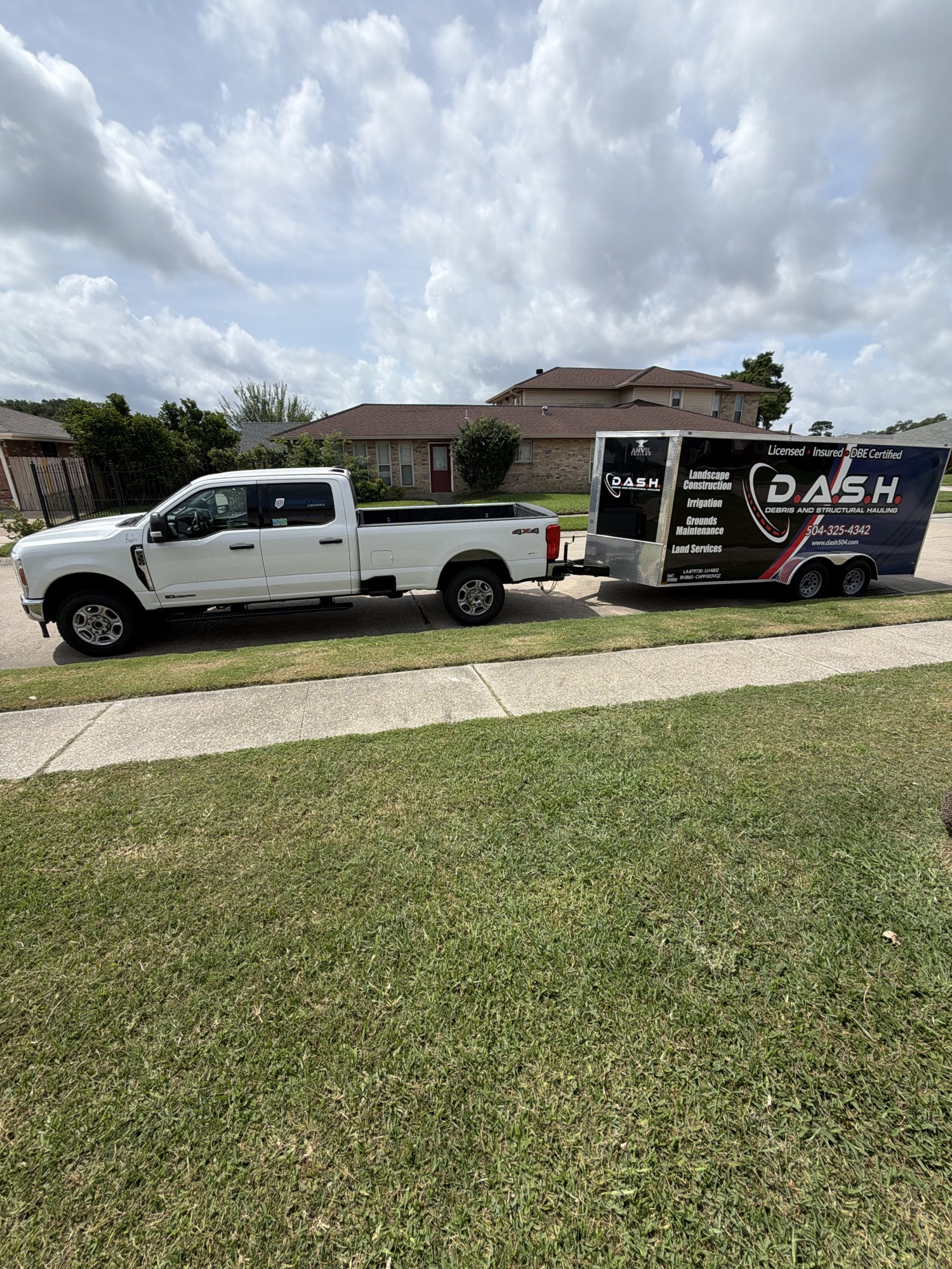 D.A.S.H. truck and branded trailer ready for a job